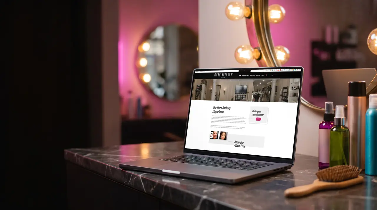 Marc Anthony True Professional website on a laptop and phone, built by Unified Marketing