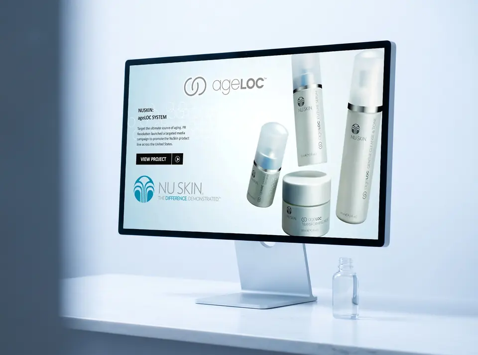 Nu Skin website on a laptop and phone