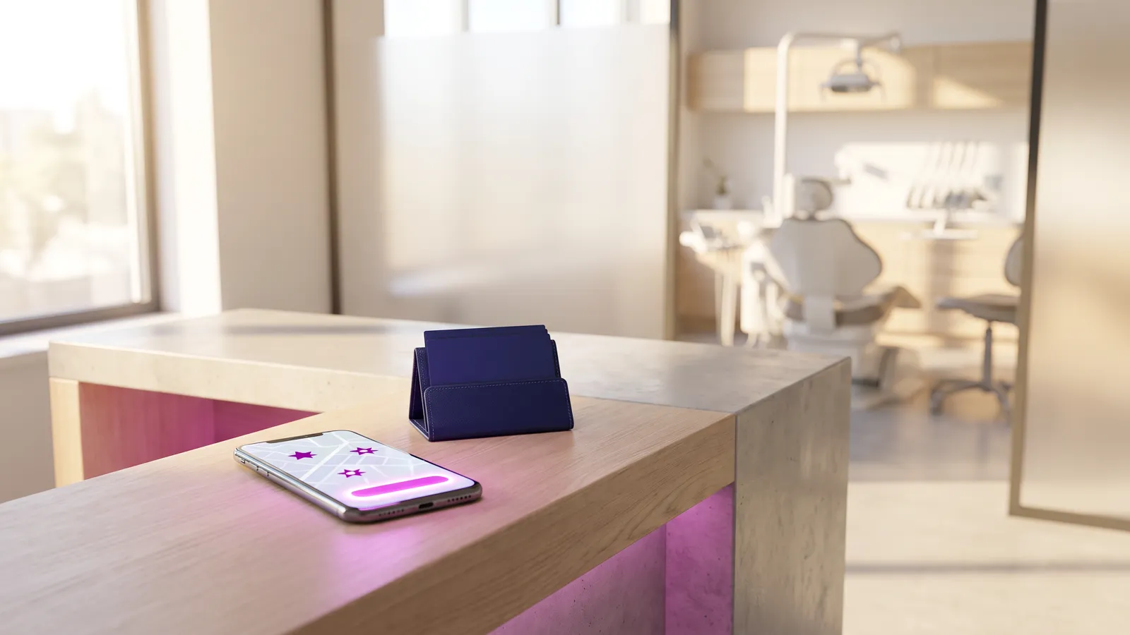 Dental marketing: phone showing a dental practice listing and booking button at the front desk
